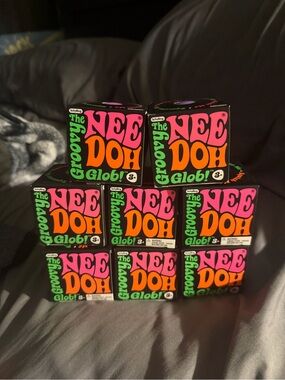 The Groovy NeeDoh Glob! Stress Ball - Pink & Orange Packaging